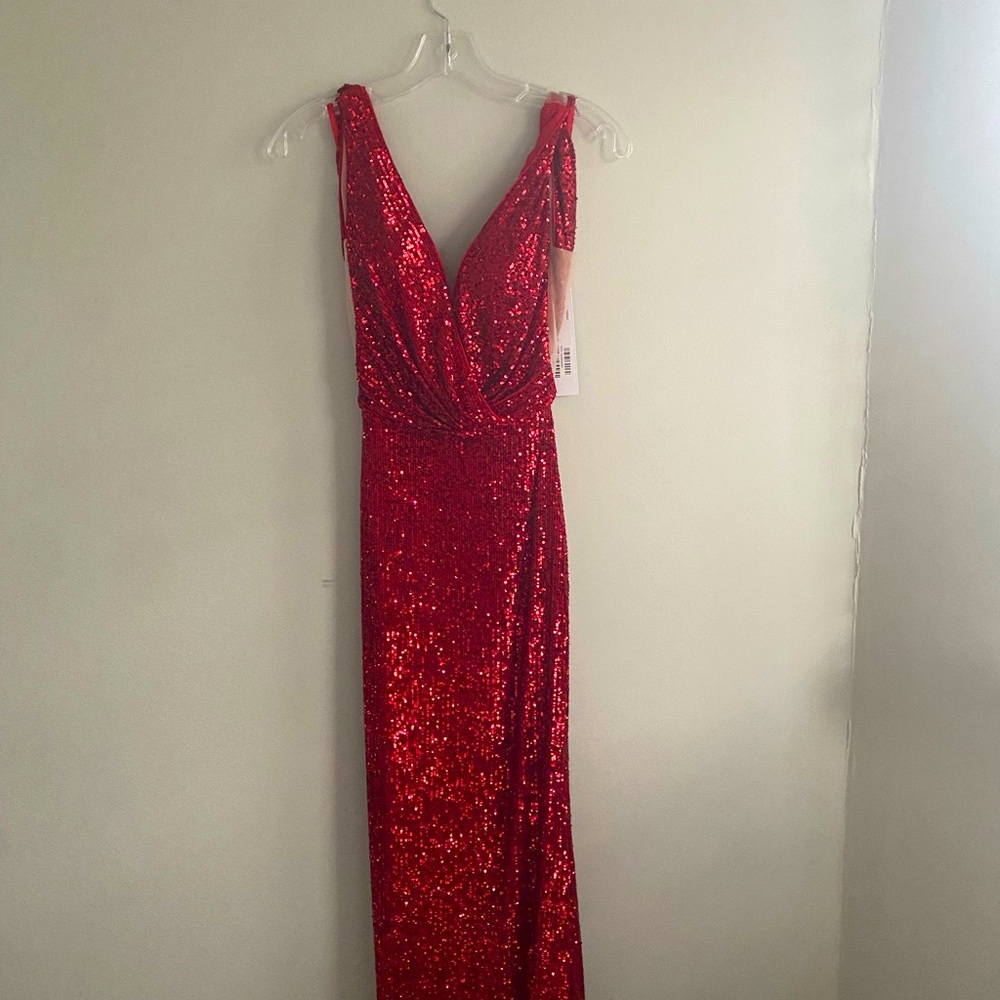 Jovani Red sequin dress with a cute short bustle on the back